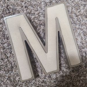 Letter M sign